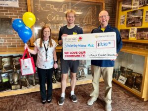 scholarship check being presented Negaunee Honor Manager: Sarah Wackerle, Student: Mick Kumpula, Negaunee High School Principal Brunette | Honor Credit Union