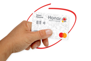 hand holding a Honor select rewards card | Honor Credit Union