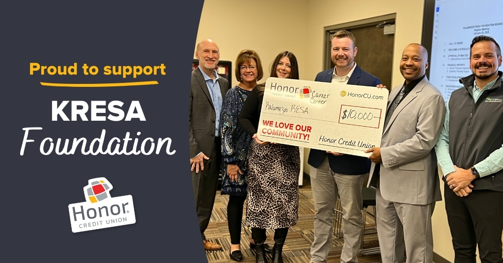 Proud to support KRESA Foundation press release image with Kalamazoo RESA receiving a check from Honor CU team members