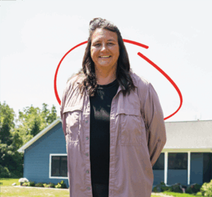 Julie, Honor member in front of her home | Honor Credit Union