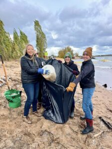 Honor Team Cleaning Beach | Honor Credit Union