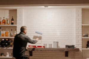 man painting a wall | Honor Credit Union