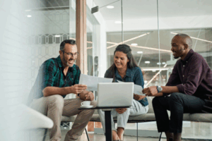 people looking over finances on a laptop | Honor Credit Union