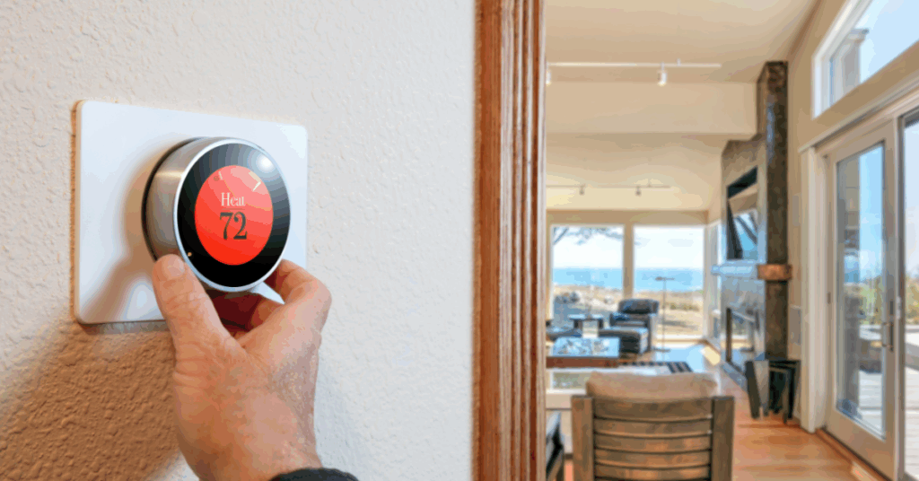 adjusting a house thermostat