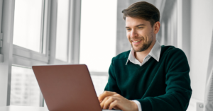 man on laptop | Honor Credit Union