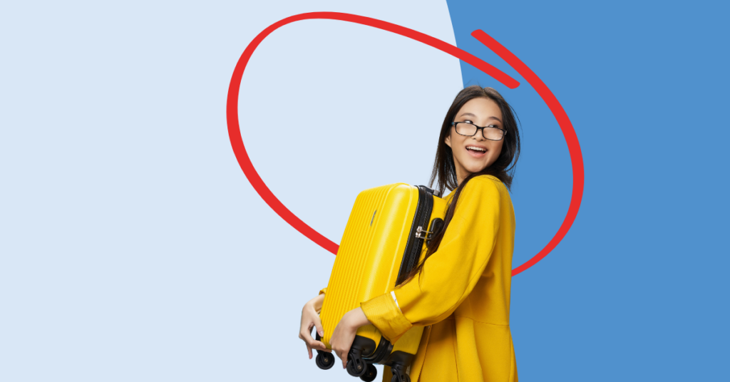 women holding luggage