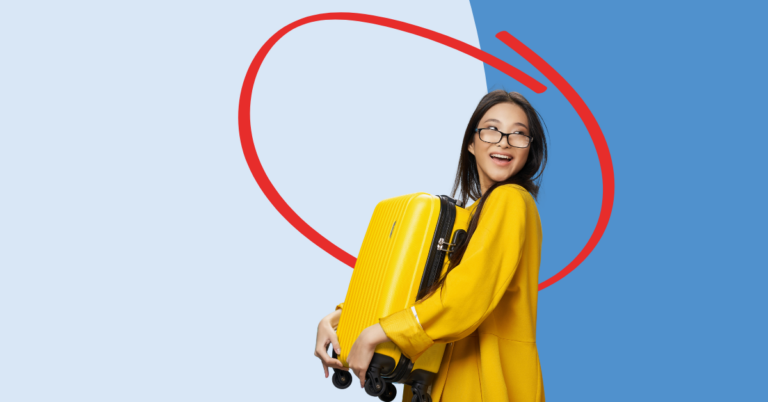 women holding luggage