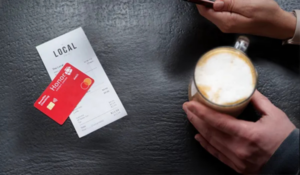 Benefits Checking card and coffee | Honor Credit Union