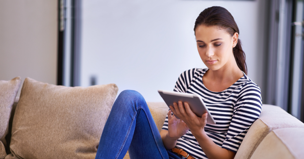 women on her ipad | Honor Credit Union