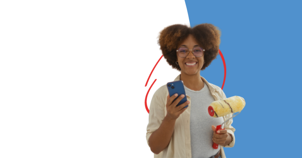 women holding a cell phone and a paint roller