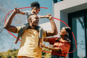 Mother and Father with his young daughter on his shoulders | Honor Credit Union