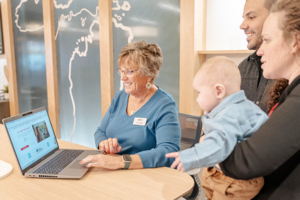 family looking at loan options with a lending expert | Honor Credit Union