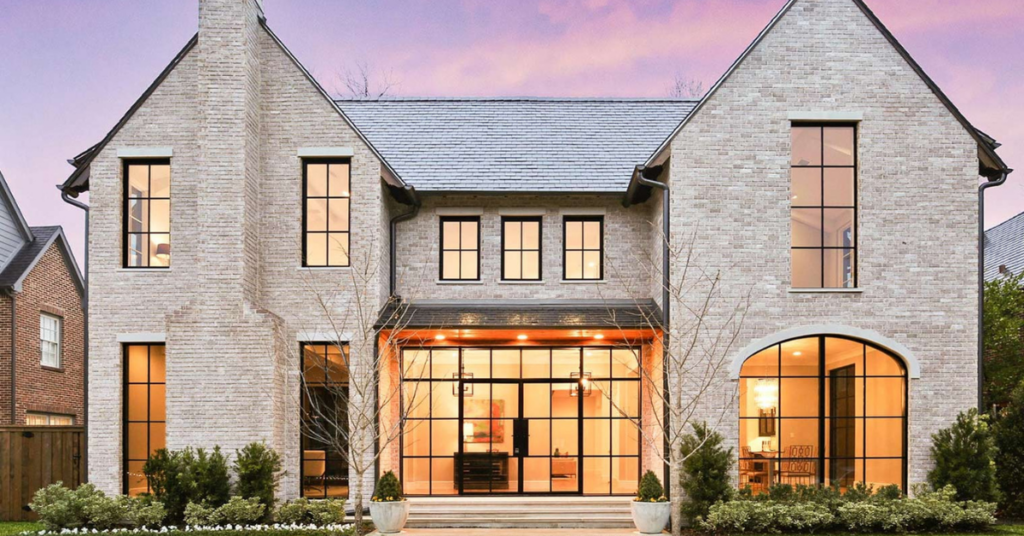 large home with a sunset background | Honor Credit Union