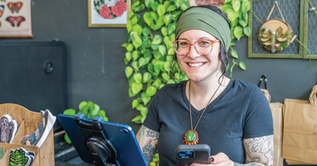 female business owner at her checkout