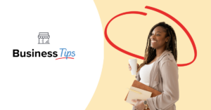 Business Tips- Women holding her coffee cup and paperwork | Honor Credit Union