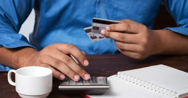 hands holding credit cards | Honor Credit Union | Honor Credit Union
