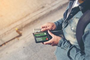 2019-select-rewards-card-double-rewards earn double reward points with an honor select rewards credit card now through december 31; photo of person pulling select rewards credit card out of a wallet