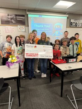 Teacher Awards Winner Becky Calvert from L.E. White Middle School in Allegan, MI with her class
