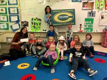 Coloma Community School's Teacher Brittany Brethauer and students with $100 Teacher Award