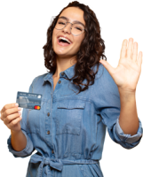 woman in blue jean dress holding an honor credit card while smiling